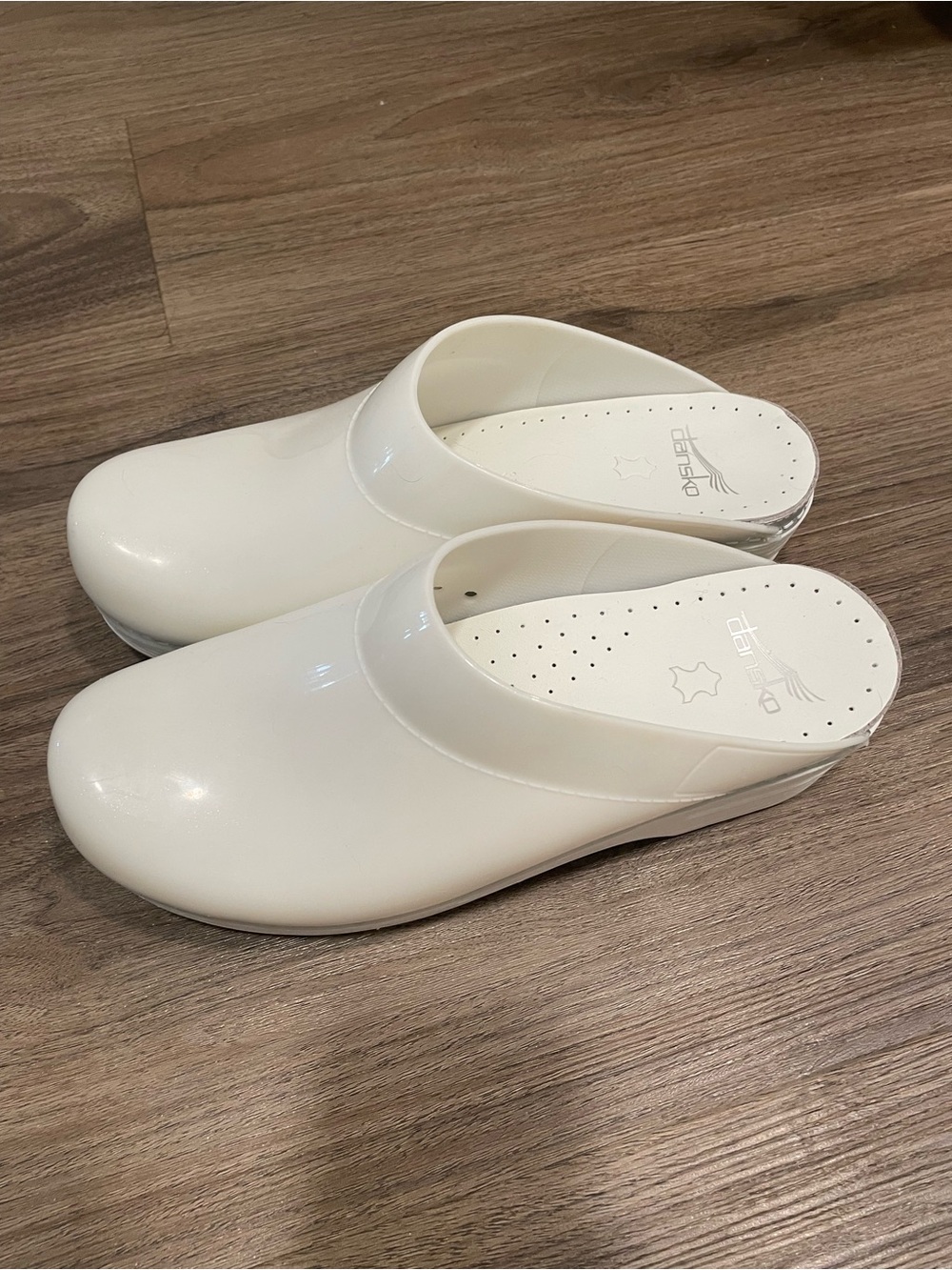 Dansko Women’s White Slip-On Clogs